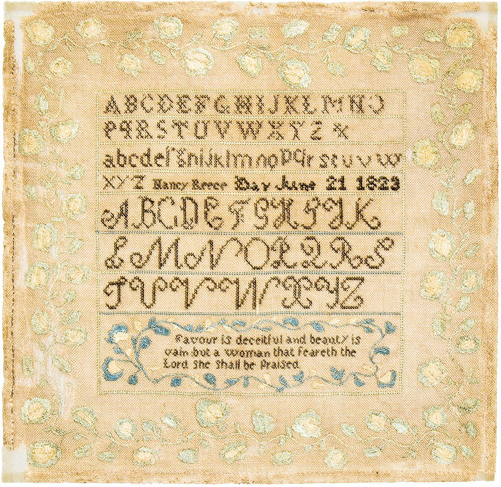 Yellowed 1823 alphabet lettering sampler with a short religious poem and a faded green vine border by Nancy Reece.